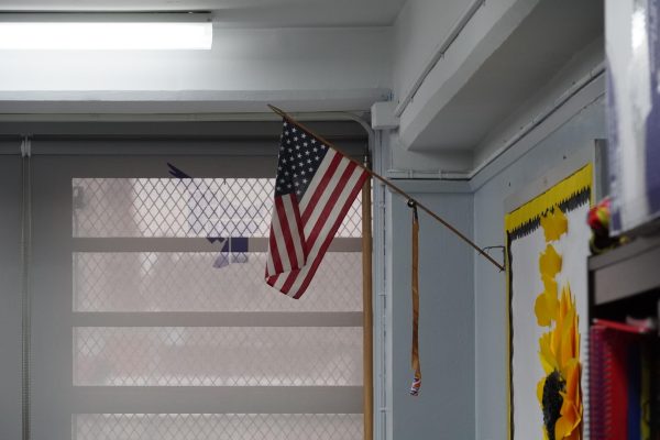 An American flag hangs in the office of AP Ms. P.