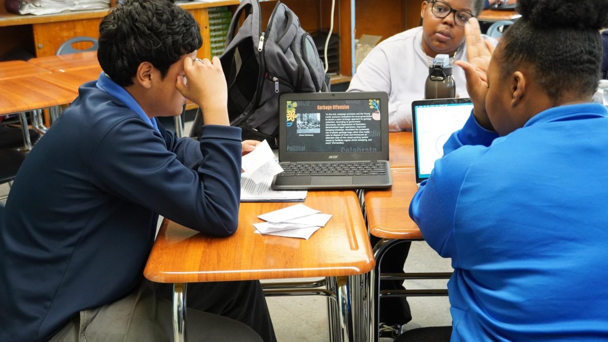 Students from the class of 2026 working on their PBAT with Ms. Lynah.
