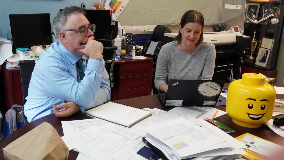 Principal Mr. Lincoln and Assistant Principal Ms. Downs hard at work.